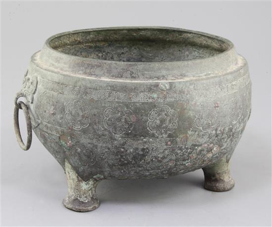 A Chinese archaic bronze tripod vessel base, Dui, Eastern Zhou dynasty, 6th-5th century B.C., 25cm wide, 15cm high, hole, lacking cover